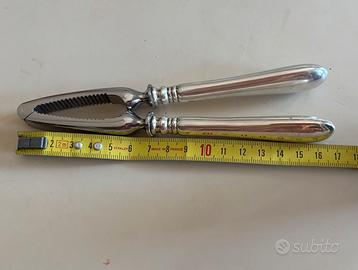 Schiaccianoci in argento 800 e acciaio inox