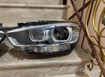 Fari bmw serie 1 SINISTRO