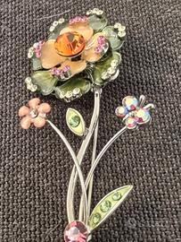 Spilla  fantasia in forma di fiore. 