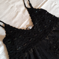 Top nero con paillettes taglia L