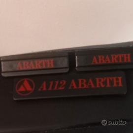 varie scritte a 112 abarth elite ecc