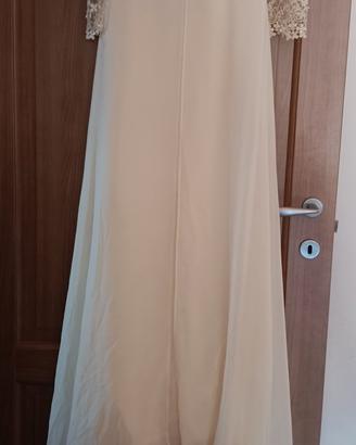 Abito da sposa vintage con velo e coda morbida