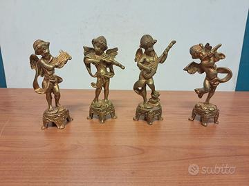 4 putti musicali 