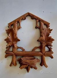 Cornice per orologio a cucù
