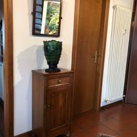 Specchio con cornice in legno