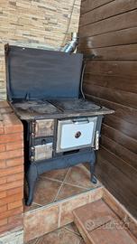 cucina, piastra e forno a legna