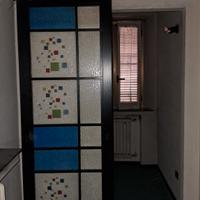 Porta scorrevole in vetro