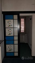 Porta scorrevole in vetro