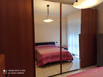 Armadio ante scorrevoli massello