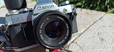 Macchina fotografica CANON AE-1 con/obiettivi