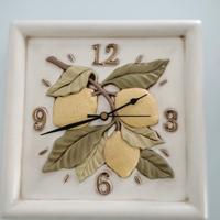 Orologio da parete in ceramica firmato Egan 