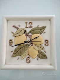 Orologio da parete in ceramica firmato Egan 