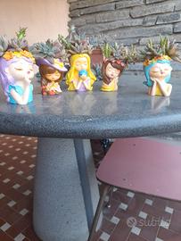 vasetti in materiale ceramico dipinti a mano