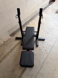 Panca palestra con bilanciere e accessori
