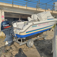 Barca, carrello e motore