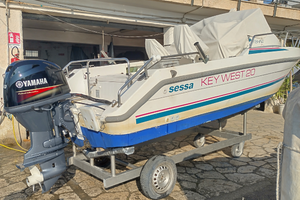 Barca, carrello e motore