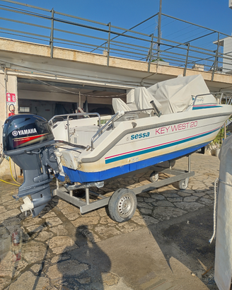 Barca, carrello e motore