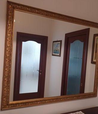 Specchio  con cornice