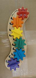 Gioco ingranaggi in legno Melissa & Doug. Bruco