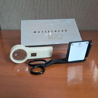 Taglia-pellicola vintage e lente d'ingrandimento 