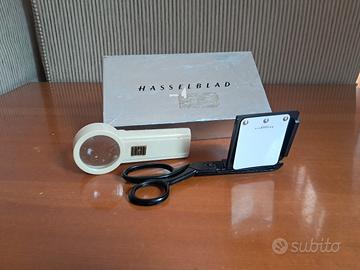 Taglia-pellicola vintage e lente d'ingrandimento 