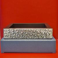 Svuotatasche con lastra d'argento.