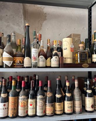 Bottiglie grappa liquore champagne barolo