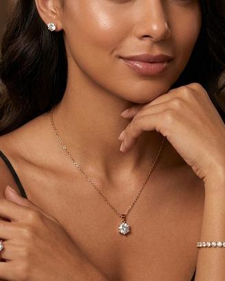 Elegante parure in acciaio placcato oro e zirconi 