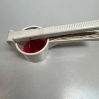 schiacciapatate in plastica