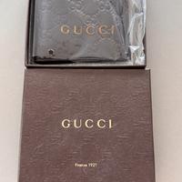 Portafoglio Gucci bi-fold GG Emblem