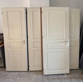 Porte in legno complete di telaio e maniglie