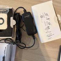 Caricabatterie da viaggio ginocchio elettronico