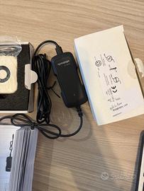 Caricabatterie da viaggio ginocchio elettronico