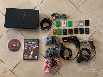 Playstation2 + 2 giochi + 3 controller e accessori