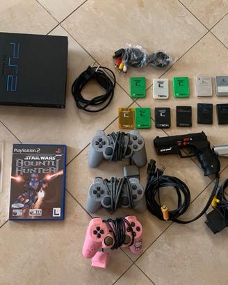 Playstation2 + 2 giochi + 3 controller e accessori