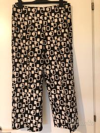 Pantalone largo corto