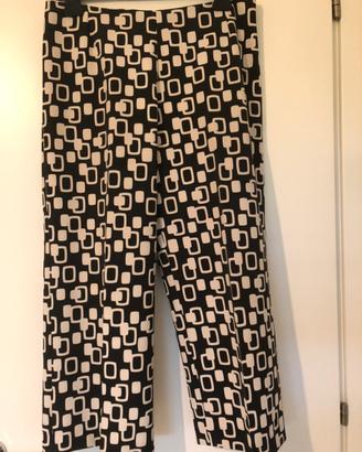 Pantalone largo corto