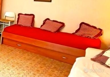 Letto, divano letto e soggiorno