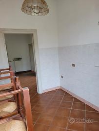 Appartamento con terreno e bosco