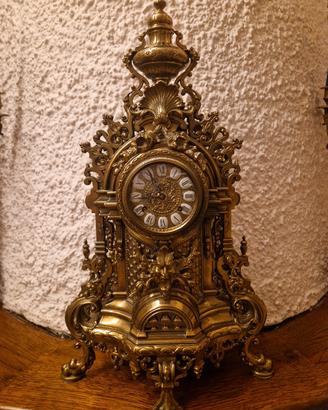 orologio  e due candelabri 
