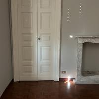 Porta in legno massello con chiambrana