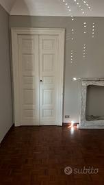 Porta in legno massello con chiambrana