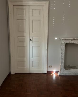 Porta in legno massello con chiambrana