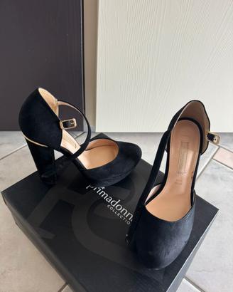 Décolleté con plateau in camoscio nero