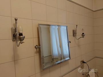 Set di specchio e due applique