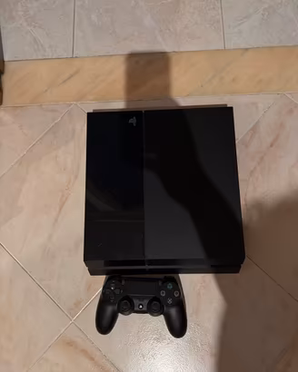 Playstation 4 + Dualshock 4