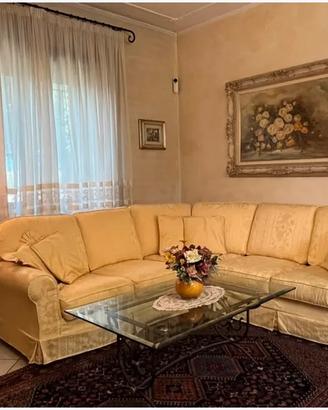 Divano angolare + tavolino in ferro e vetro+quadro