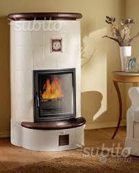 STUFA THUN a Legna in Maiolica modello Latemar