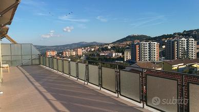 Ampie Camere in Attico con Terrazzo Panoramico