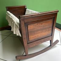 Culla a dondolo in legno